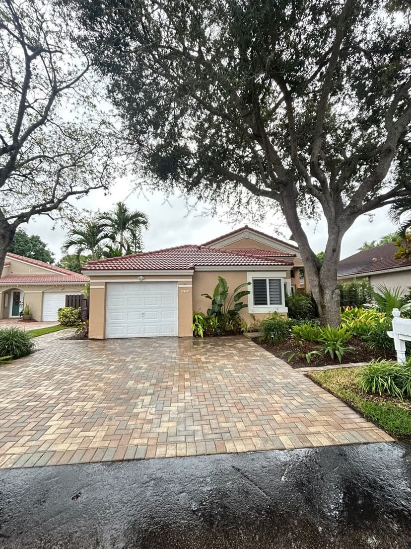 Driveway sealed with a wet-look finish.