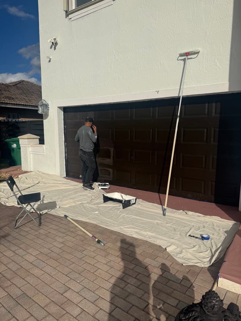 Garage door getting its new color.