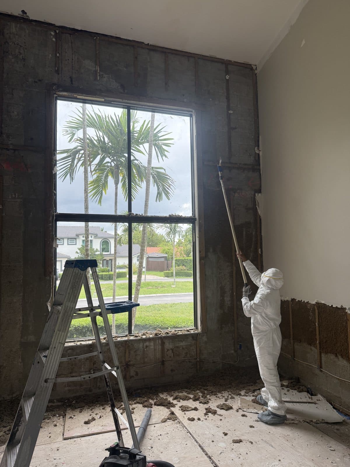 Before - Two-Story Wall Repair and Paint