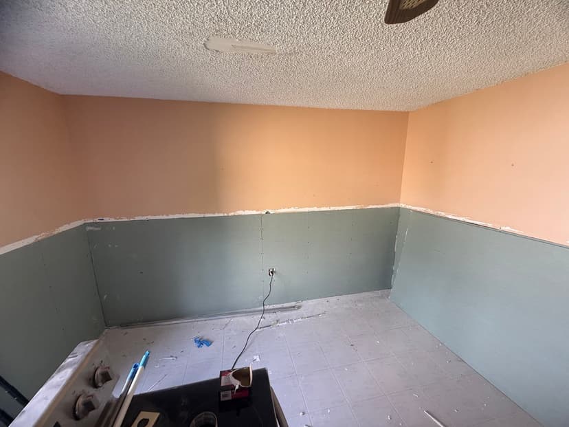 New moisture-resistant drywall hung.